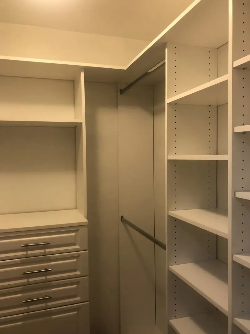 Custom closet with drawers and open shelving
