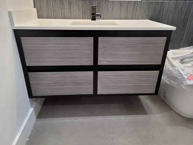 Modern floating vanity with wood-grain drawers